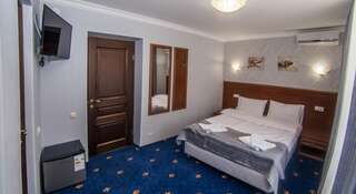 Апартаменты Загородный отель Грасс Парк Талдом Стандартный двухместный номер с 2 отдельными кроватями-1